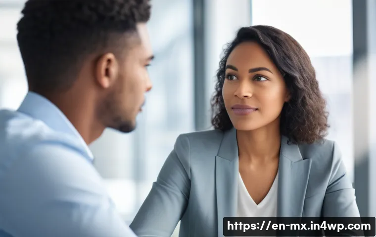 비폭력 커뮤니케이션의 심리학 - A warm, inviting office setting with two diverse adults engaged in a deep conversation, one person a...